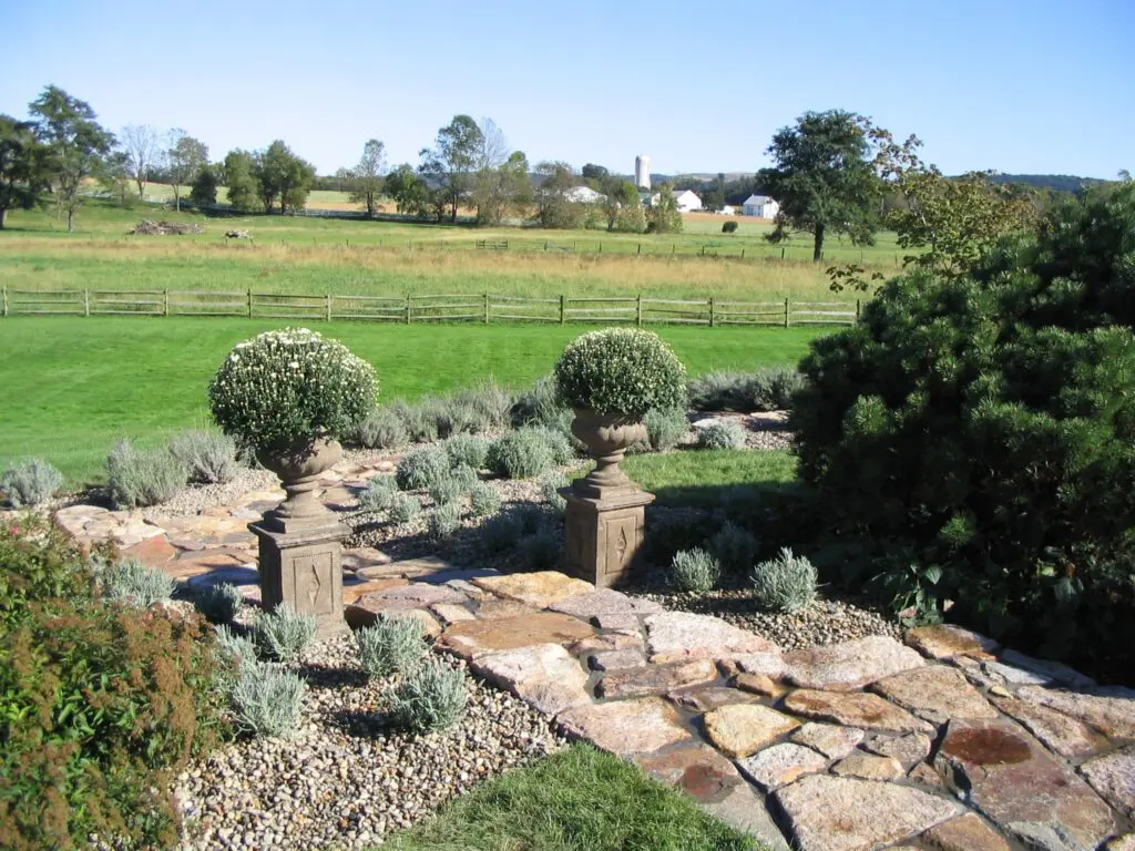 French Lavender Garden And Rustic Stone Paths Complement Farmhouse Landscape, Morgantown, Pa