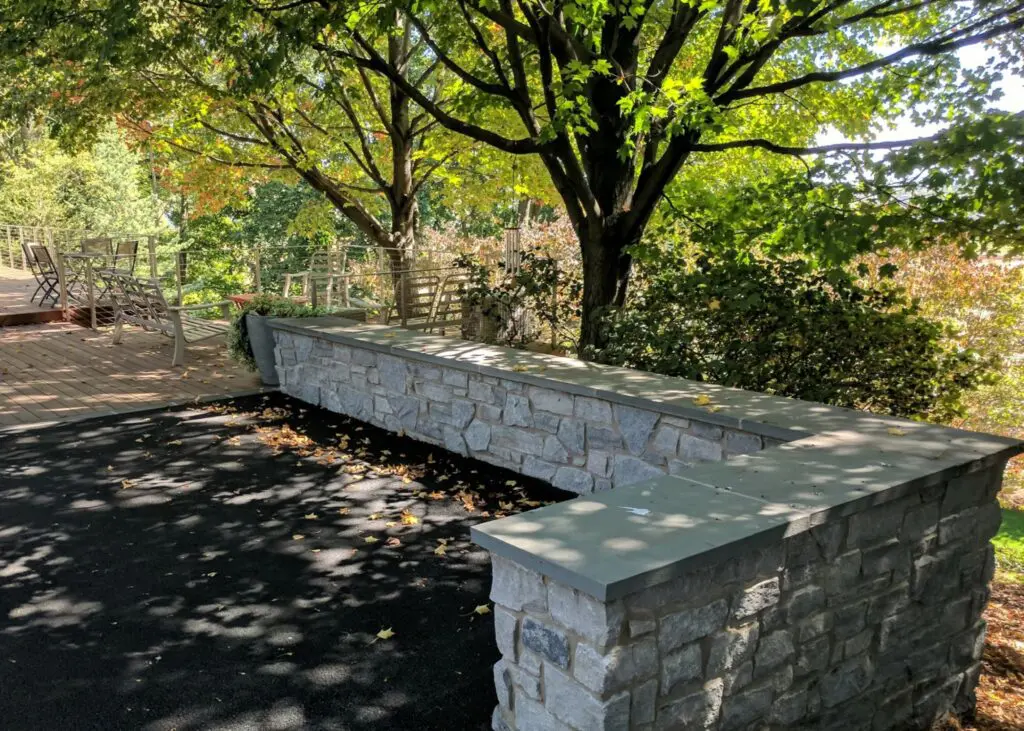 Natural Stone Seating Wall Continues Clean Modern Lines Of Deck, Lititz, Pa