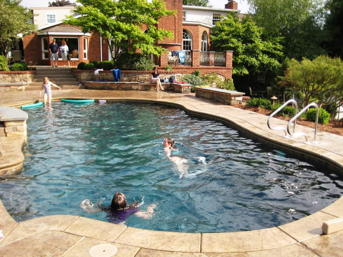 Custom Pool-Side Terraces Add Seating (Without Clutter) For Gatherings Around Pool With Built-In Swim Jets, Lancaster, Pa