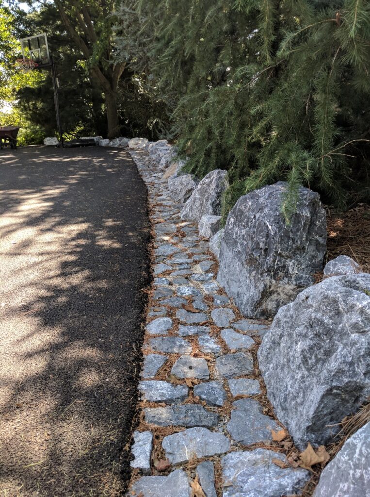 Natural Stone Drain Channel And Boulder Curb Removes Puddles, Prevents Erosion In Heavy Rains And Is A Safe Place To Step, Lititz, Pa