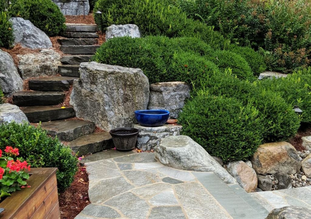 Japanese Gardens 14 A Backyard Japanese Garden Idea That Incorporates Evergreens And Stone Stairs In Its Design.